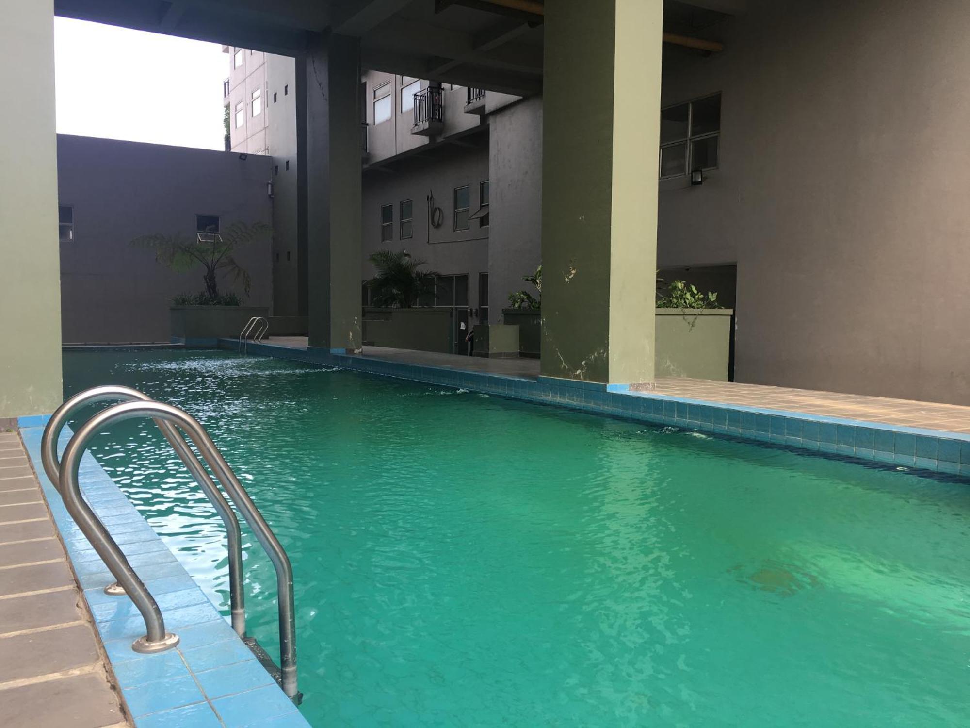 Apartemen Comfy 2br At Grand Afrika By Travelio *