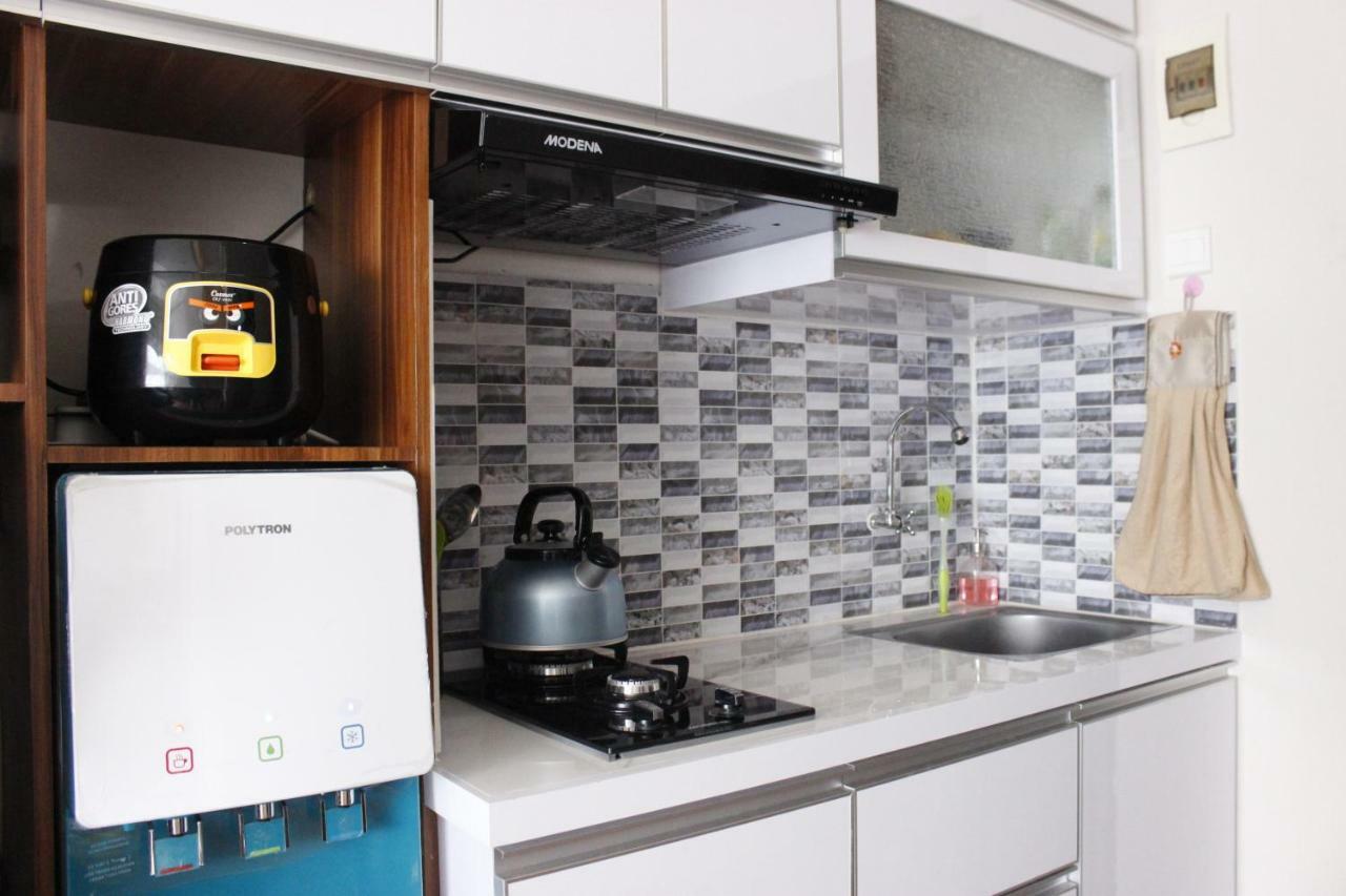 Apartemen Comfy 2br At Grand Afrika By Travelio